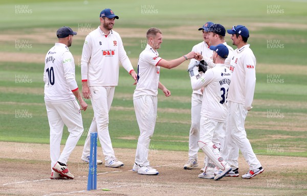 010921 - Glamorgan v Essex - LV= County Championship - Jamie Porter of Essex celebrates taking the wicket of Andrew Salter of Glamorgan with team mates