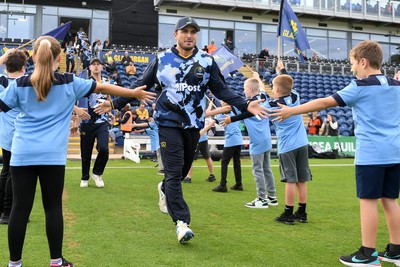 060625 - Glamorgan v Essex - T20 Vitality Blast - Kiran Carlson of Glamorgan runs out for the start of the match