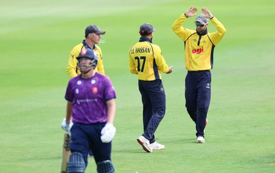 070826 - Glamorgan v Essex, Metro Bank One Day Cup - Zain ul Hassan of Glamorgan is congratulated after he runs out Matt Critchley of Essex