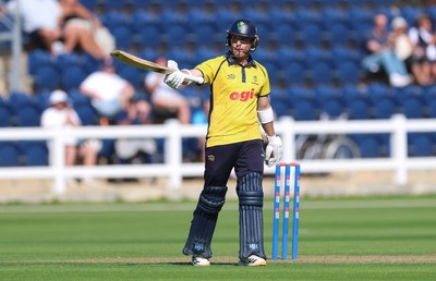 070826 - Glamorgan v Essex, Metro Bank One Day Cup - Alex Horton of Glamorgan raises his bat as he reaches his 50