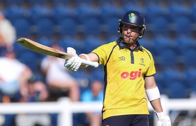 070826 - Glamorgan v Essex, Metro Bank One Day Cup - Alex Horton of Glamorgan raises his bat as he reaches his 50