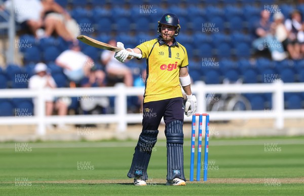 070826 - Glamorgan v Essex, Metro Bank One Day Cup - Alex Horton of Glamorgan raises his bat as he reaches his 50