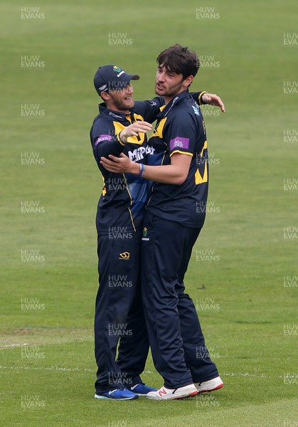 170419 - Glamorgan Cricket v Essex - Royal London One-Day Cup - Lukas Carey of Glamorgan celebrates with Billy Root after Michael Hogan catches Tom Westley of Essex
