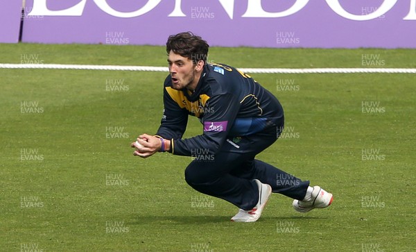 170419 - Glamorgan Cricket v Essex - Royal London One-Day Cup - Lukas Carey of Glamorgan catches the ball to dismiss Dan Lawrence of Essex