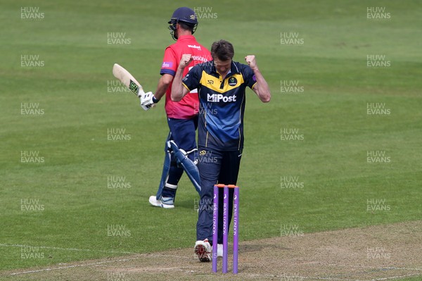 170419 - Glamorgan Cricket v Essex - Royal London One-Day Cup - Michael Hogan of Glamorgan celebrates the wicket of Ryan ten Doeschate who is caught by Kiran Carlson