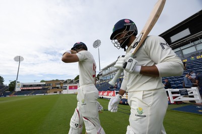 240926 Glamorgan v Essex, Rothesay County Championship Division 1 - Asa Tribe of Glamorgan and Zain ul Hassan of Glamorgan walk out at the start of the innings