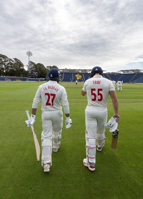 240926 Glamorgan v Essex, Rothesay County Championship Division 1 - Asa Tribe of Glamorgan and Zain ul Hassan of Glamorgan walk out at the start of the innings