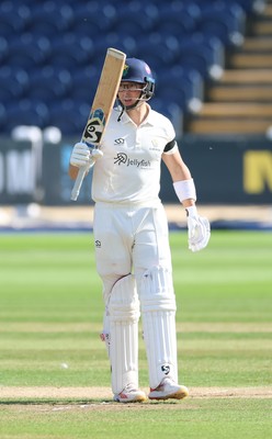 240926 Glamorgan v Essex, Rothesay County Championship Division 1 - Asa Tribe of Glamorgan celebrates as he makes his 50