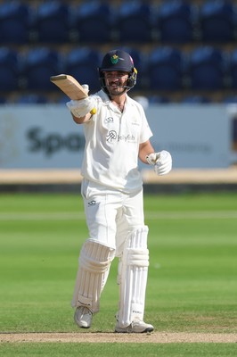 240926 Glamorgan v Essex, Rothesay County Championship Division 1 - Kiran Carlson of Glamorgan celebrates as he makes his 50