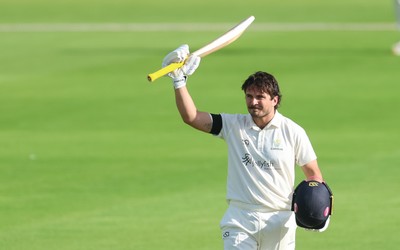 240926 Glamorgan v Essex, Rothesay County Championship Division 1 - Kiran Carlson of Glamorgan celebrates as he makes his 100
