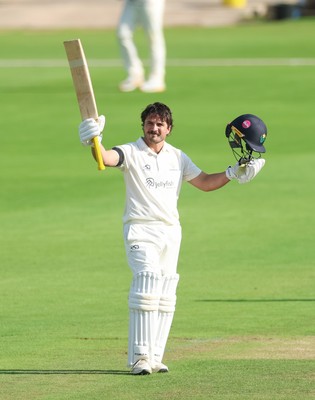 240926 Glamorgan v Essex, Rothesay County Championship Division 1 - Kiran Carlson of Glamorgan celebrates as he makes his 100