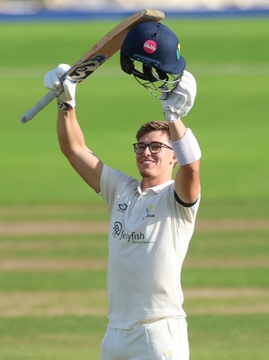 240926 Glamorgan v Essex, Rothesay County Championship Division 1 - Asa Tribe of Glamorgan celebrates as he makes his 100