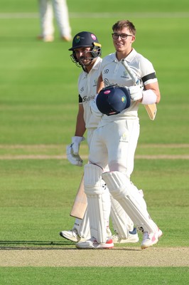 240926 Glamorgan v Essex, Rothesay County Championship Division 1 - Asa Tribe of Glamorgan celebrates with Kiran Carlson of Glamorgan as he makes his 100