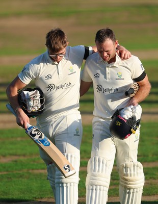 240926 Glamorgan v Essex, Rothesay County Championship Division 1 - Asa Tribe of Glamorgan, left, leaves the pitch at the end of the day’s play on 135 not out, along with Colin Ingram of Glamorgan