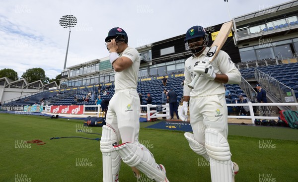 240926 Glamorgan v Essex, Rothesay County Championship Division 1 - Asa Tribe of Glamorgan and Zain ul Hassan of Glamorgan walk out at the start of the innings