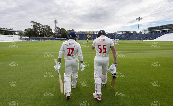 240926 Glamorgan v Essex, Rothesay County Championship Division 1 - Asa Tribe of Glamorgan and Zain ul Hassan of Glamorgan walk out at the start of the innings