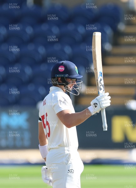 240926 Glamorgan v Essex, Rothesay County Championship Division 1 - Asa Tribe of Glamorgan celebrates as he makes his 50