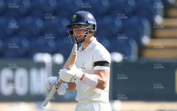 240926 Glamorgan v Essex, Rothesay County Championship Division 1 - Asa Tribe of Glamorgan celebrates as he makes his 50