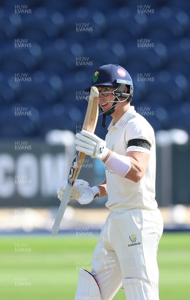 240926 Glamorgan v Essex, Rothesay County Championship Division 1 - Asa Tribe of Glamorgan celebrates as he makes his 50