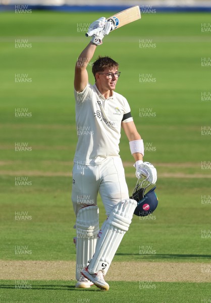 240926 Glamorgan v Essex, Rothesay County Championship Division 1 - Asa Tribe of Glamorgan celebrates as he makes his 100