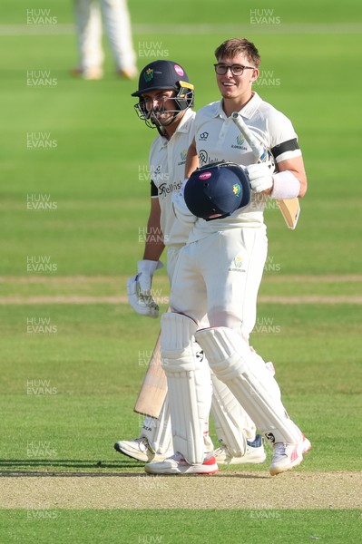 240926 Glamorgan v Essex, Rothesay County Championship Division 1 - Asa Tribe of Glamorgan celebrates with Kiran Carlson of Glamorgan as he makes his 100