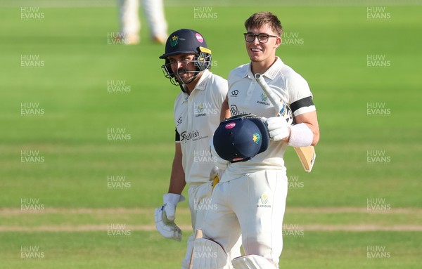 240926 Glamorgan v Essex, Rothesay County Championship Division 1 - Asa Tribe of Glamorgan celebrates with Kiran Carlson of Glamorgan as he makes his 100