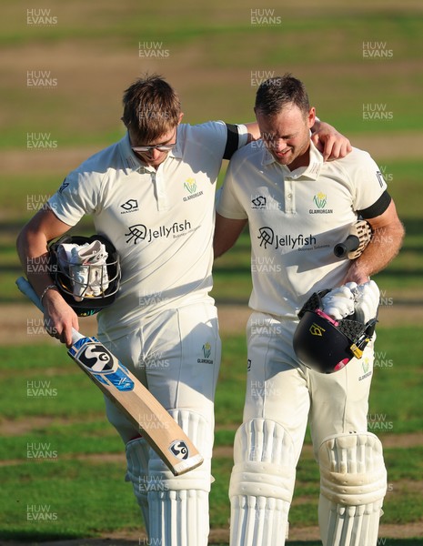 240926 Glamorgan v Essex, Rothesay County Championship Division 1 - Asa Tribe of Glamorgan, left, leaves the pitch at the end of the day’s play on 135 not out, along with Colin Ingram of Glamorgan