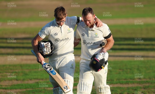 240926 Glamorgan v Essex, Rothesay County Championship Division 1 - Asa Tribe of Glamorgan, left, leaves the pitch at the end of the day’s play on 135 not out, along with Colin Ingram of Glamorgan
