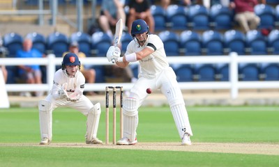 250926 Glamorgan v Essex, Rothesay County Championship Division 1 - Asa Tribe of Glamorgan hits a four as he reaches 150