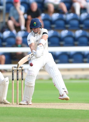 250926 Glamorgan v Essex, Rothesay County Championship Division 1 - Asa Tribe of Glamorgan hits a four as he reaches 150