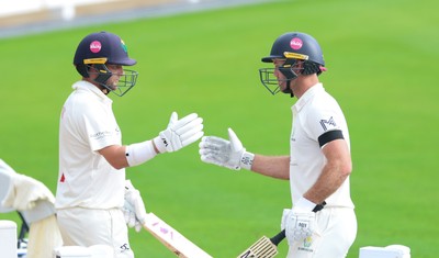 250926 Glamorgan v Essex, Rothesay County Championship Division 1 - Billy Root of Glamorgan acknowledges Colin Ingram as he replaces him