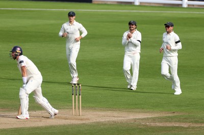 260926 - Glamorgan v Essex - Rothesay County Championship Division 1 - Kiran Carlson of Glamorgan catches the ball to dismiss Sam Cook