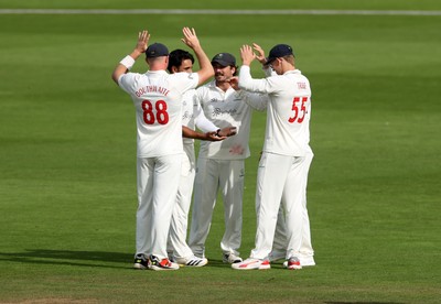 260926 - Glamorgan v Essex - Rothesay County Championship Division 1 - Zain ul Hassan of Glamorgan celebrates taking the wicket of Simon Harmer with Asa Tribe
