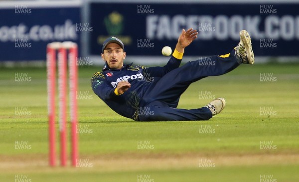 070818 - Glamorgan v Essex Eagles, Vitality Blast T20 - Andrew Salter of Glamorgan dives to field the ball back at the wicket