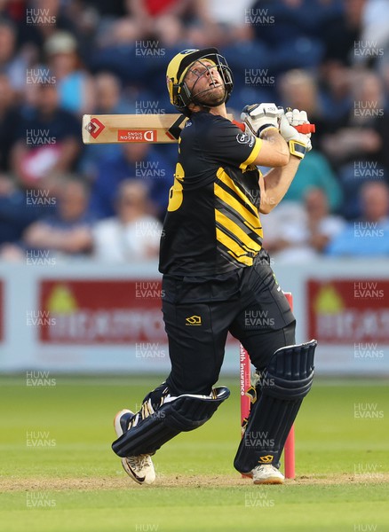 090623 - Glamorgan v Essex Eagles, Vitality Blast T20 - Chris Cooke of Glamorgan sends his shot skywards as he is caught and bowled by Paul Walter of Essex Eagles