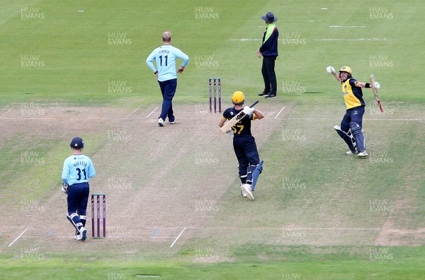 160821 - Glamorgan v Essex Eagles - Royal London One-Day Cup - Joe Cooke of Glamorgan and Tom Cullen celebrate as Glamorgan win the match