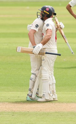 010725  Glamorgan v Gloucestershire, Rothesay County Championship Division 2 - Ben Kellaway of Glamorgan and Colin Ingram of Glamorgan congratulate each other as they both make 100