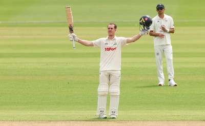 010725  Glamorgan v Gloucestershire, Rothesay County Championship Division 2 - Ben Kellaway celebrates as he makes his 100