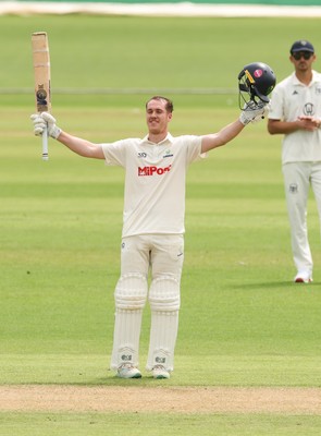 010725  Glamorgan v Gloucestershire, Rothesay County Championship Division 2 - Ben Kellaway celebrates as he makes his 100
