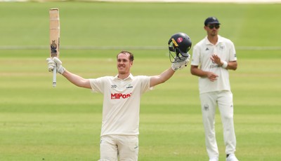 010725  Glamorgan v Gloucestershire, Rothesay County Championship Division 2 - Ben Kellaway celebrates as he makes his 100