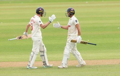 010725  Glamorgan v Gloucestershire, Rothesay County Championship Division 2 - Ben Kellaway of Glamorgan and Colin Ingram of Glamorgan congratulate each other as they both make 100
