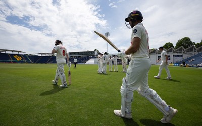 010725  Glamorgan v Gloucestershire, Rothesay County Championship Division 2 - Colin Ingram of Glamorgan and Ben Kellaway of Glamorgan resume their 200 plus run partnership as they head back out to the wicket after lunch