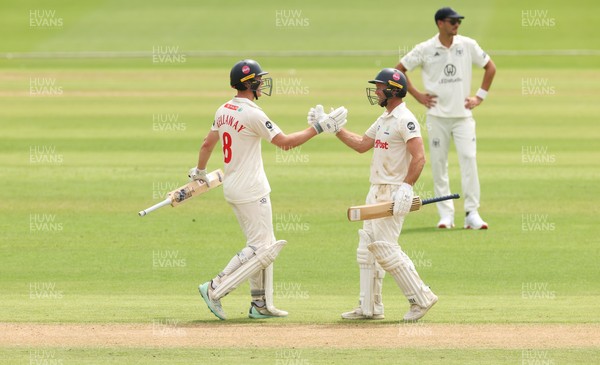 010725  Glamorgan v Gloucestershire, Rothesay County Championship Division 2 - Ben Kellaway of Glamorgan and Colin Ingram of Glamorgan congratulate each other as they both make 100