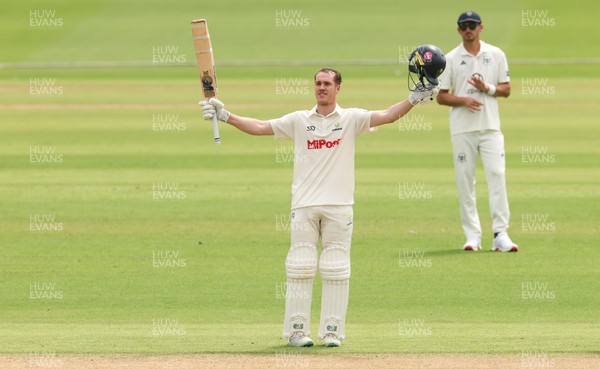 010725  Glamorgan v Gloucestershire, Rothesay County Championship Division 2 - Ben Kellaway celebrates as he makes his 100