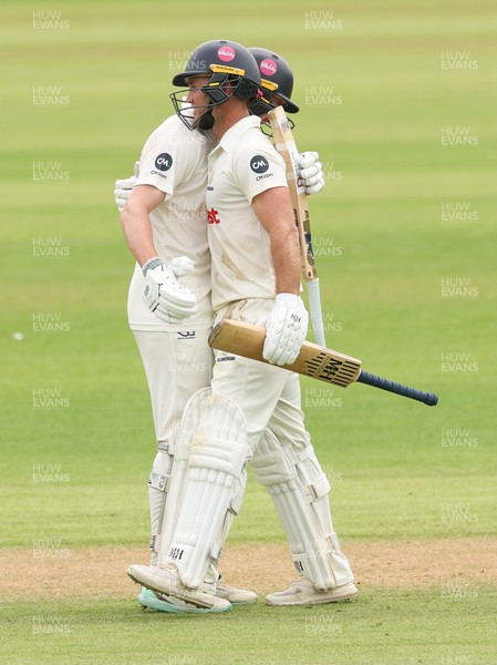 010725  Glamorgan v Gloucestershire, Rothesay County Championship Division 2 - Ben Kellaway of Glamorgan and Colin Ingram of Glamorgan congratulate each other as they both make 100