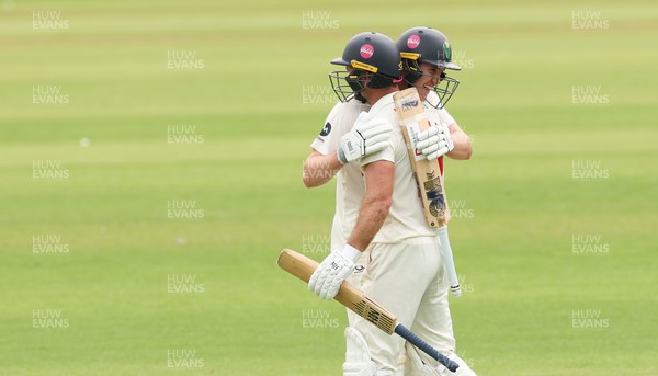 010725  Glamorgan v Gloucestershire, Rothesay County Championship Division 2 - Ben Kellaway of Glamorgan and Colin Ingram of Glamorgan congratulate each other as they both make 100