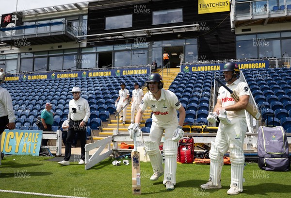 010725  Glamorgan v Gloucestershire, Rothesay County Championship Division 2 - Colin Ingram of Glamorgan and Ben Kellaway of Glamorgan resume their 200 plus run partnership as they head back out to the wicket after lunch