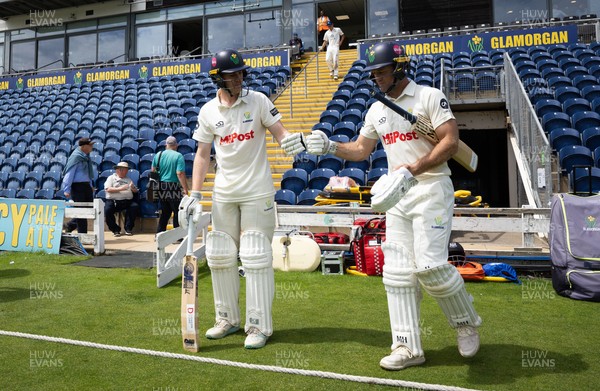 010725  Glamorgan v Gloucestershire, Rothesay County Championship Division 2 - Colin Ingram of Glamorgan and Ben Kellaway of Glamorgan resume their 200 plus run partnership as they head back out to the wicket after lunch