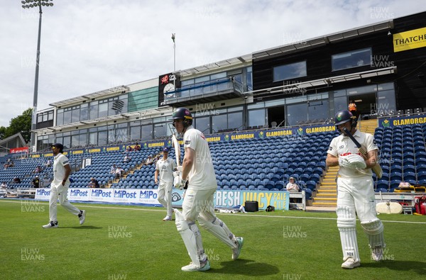 010725  Glamorgan v Gloucestershire, Rothesay County Championship Division 2 - Colin Ingram of Glamorgan and Ben Kellaway of Glamorgan resume their 200 plus run partnership as they head back out to the wicket after lunch