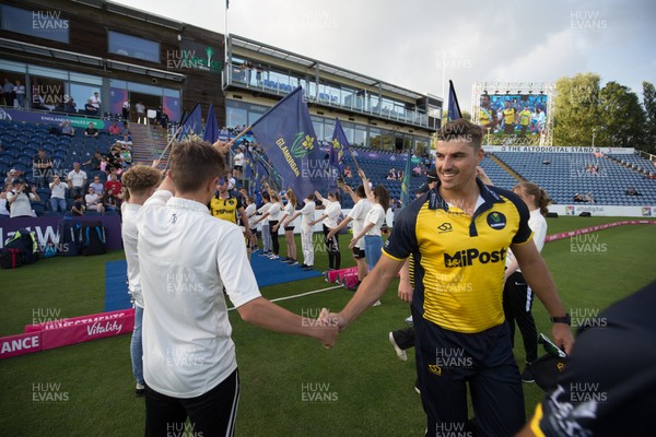 010819 - Glamorgan v Gloucestershire, Vitality Blast 2019 - Marchant de Lange of Glamorgan makes his way to the pitch at the start of the match
